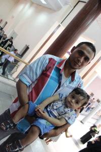 My martyred uncle Mohammed Abu-Louz and his 2-year-old son